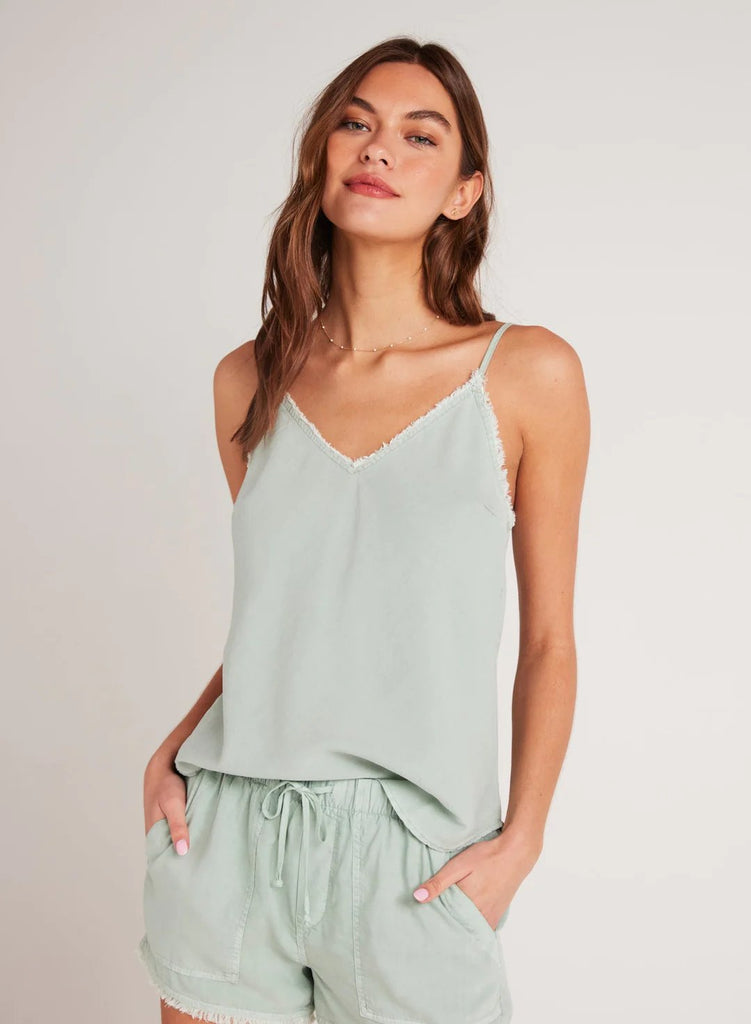 bella dahl frayed cami in oasis green styled with matching shorts on model