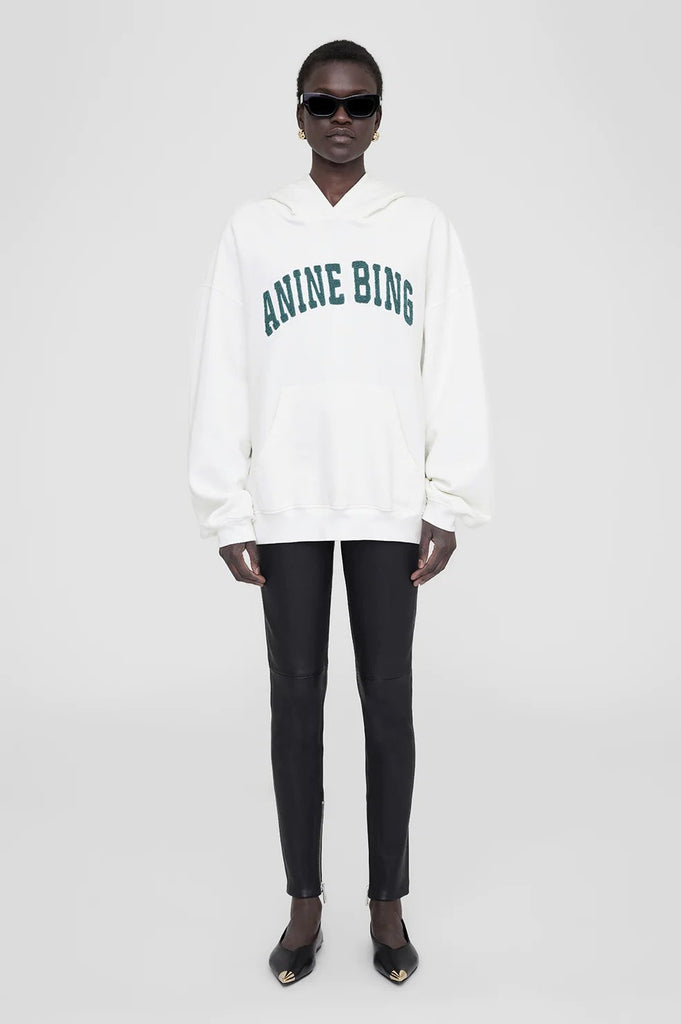 anine bing harvey hoodie sweatshirt in ivory with dark sage "anine bing" letters styled on model