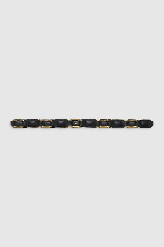 anine bign mini jody belt in black with gold-tone hardware and smooth leather. Finished with a clasp opening engraved with subtle ANINE BING branding. True to size.
