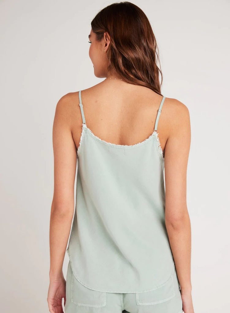 Behind view of bella dahl frayed cami in oasis green styled with matching shorts on model