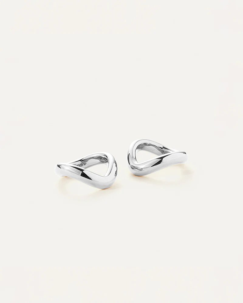 Jenny Bird's ola ring set in high polish silver. A dynamic, tubular ring set. Image includes two rings next to each other.