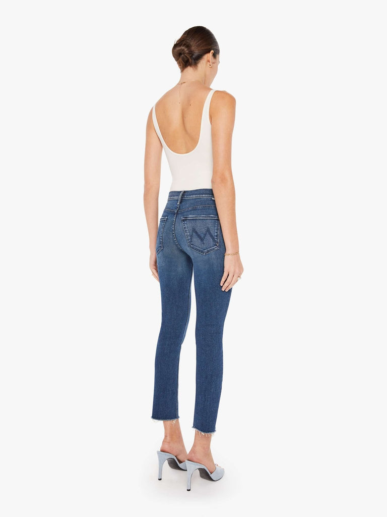 Behind view of mother jeans in midrise dazzler ankle fray in cest la vie
