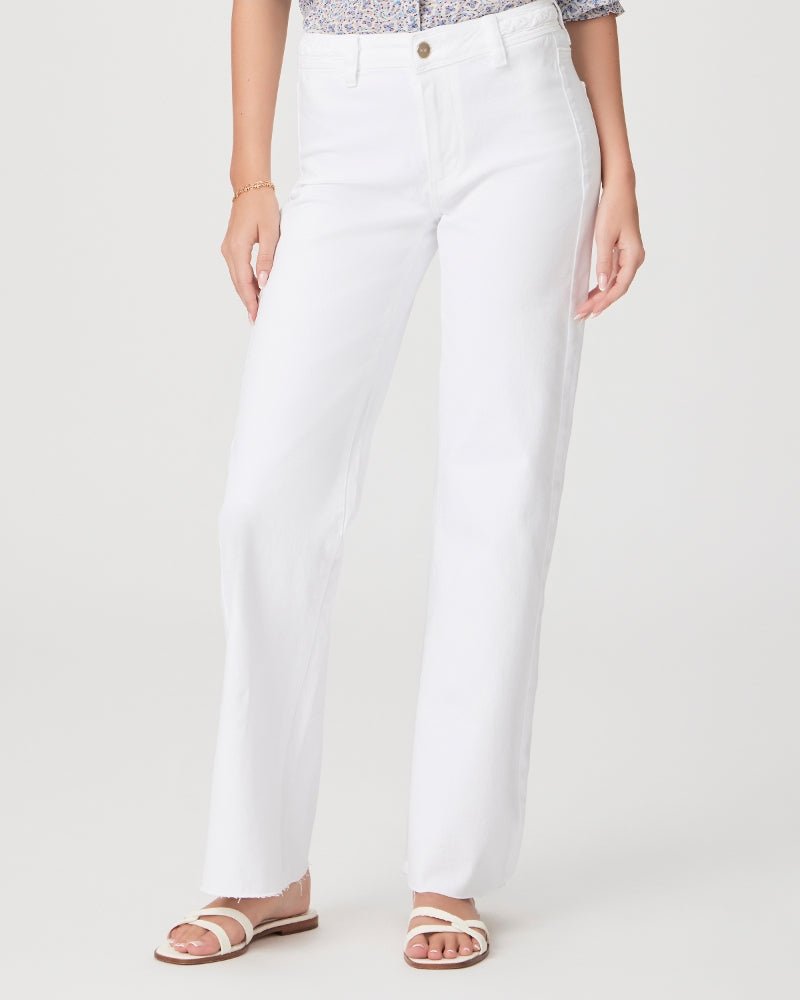 piage leenah 32 jeans in crisp white styled on model with white sandals