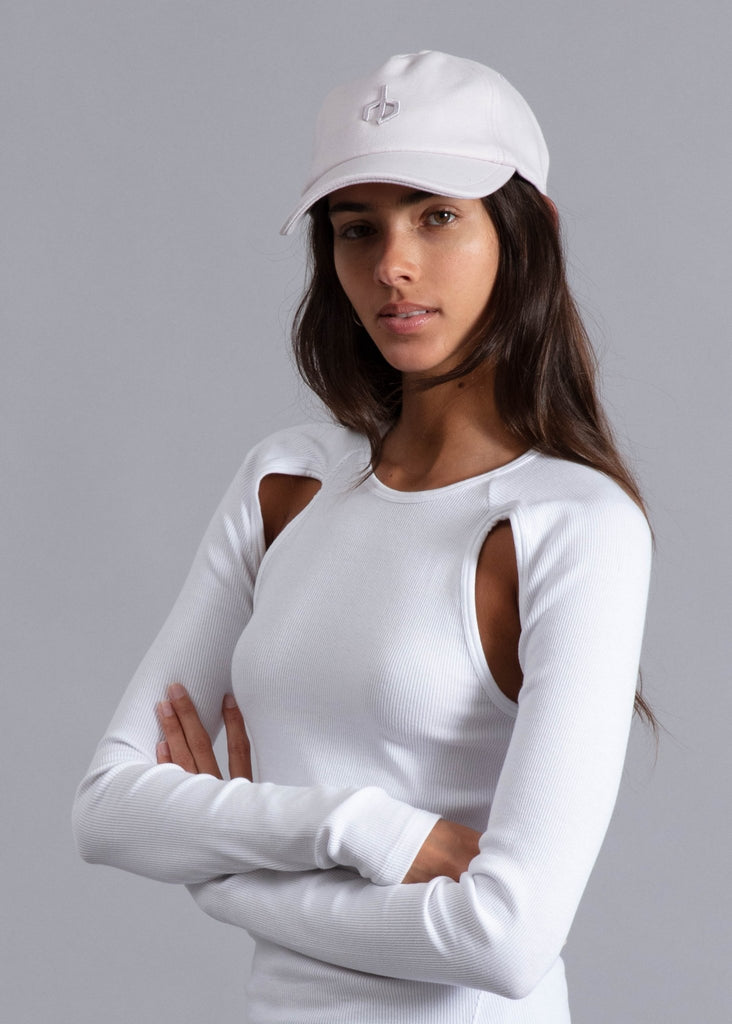rag and bone aron baseball cap in pure white styled on model