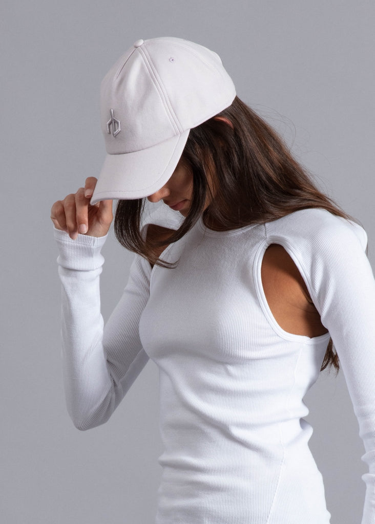 rag and bone aron baseball cap in pure white styled on model all white outfit