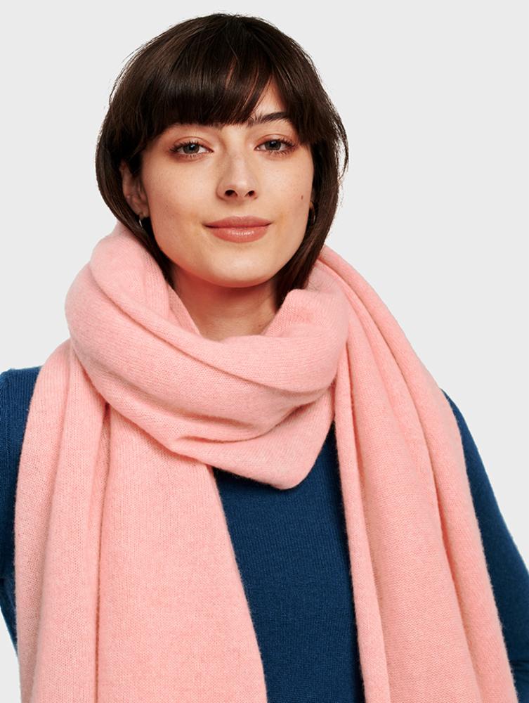 white and warren cashmere travel wrap in pink lemonade on model